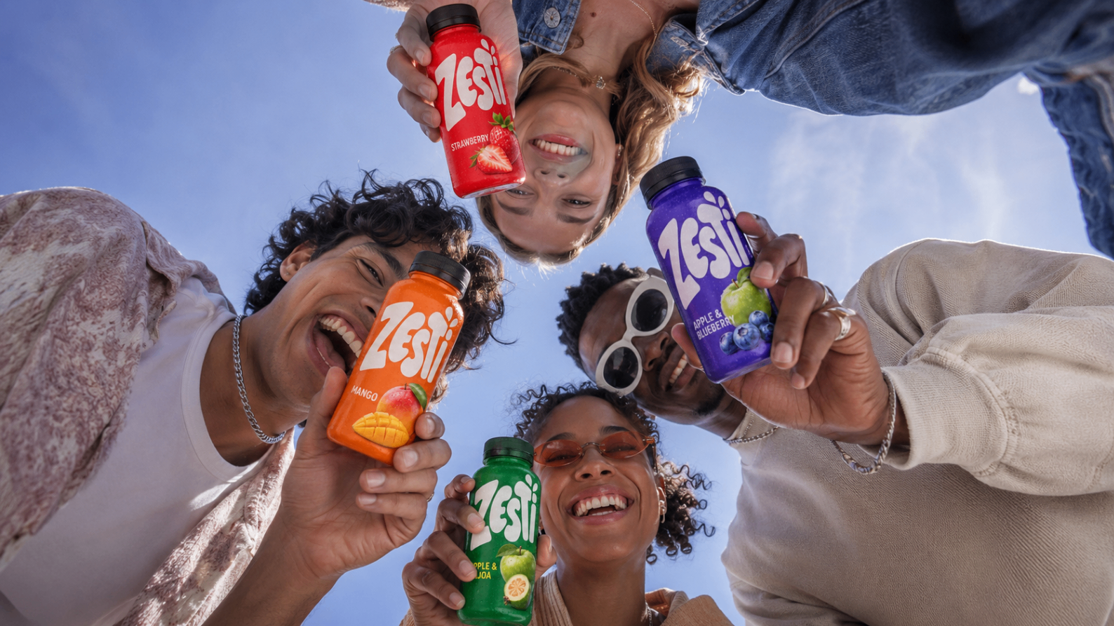 Hero campaign image bringing all four variants into one energetic social frame with sky-led perspective.