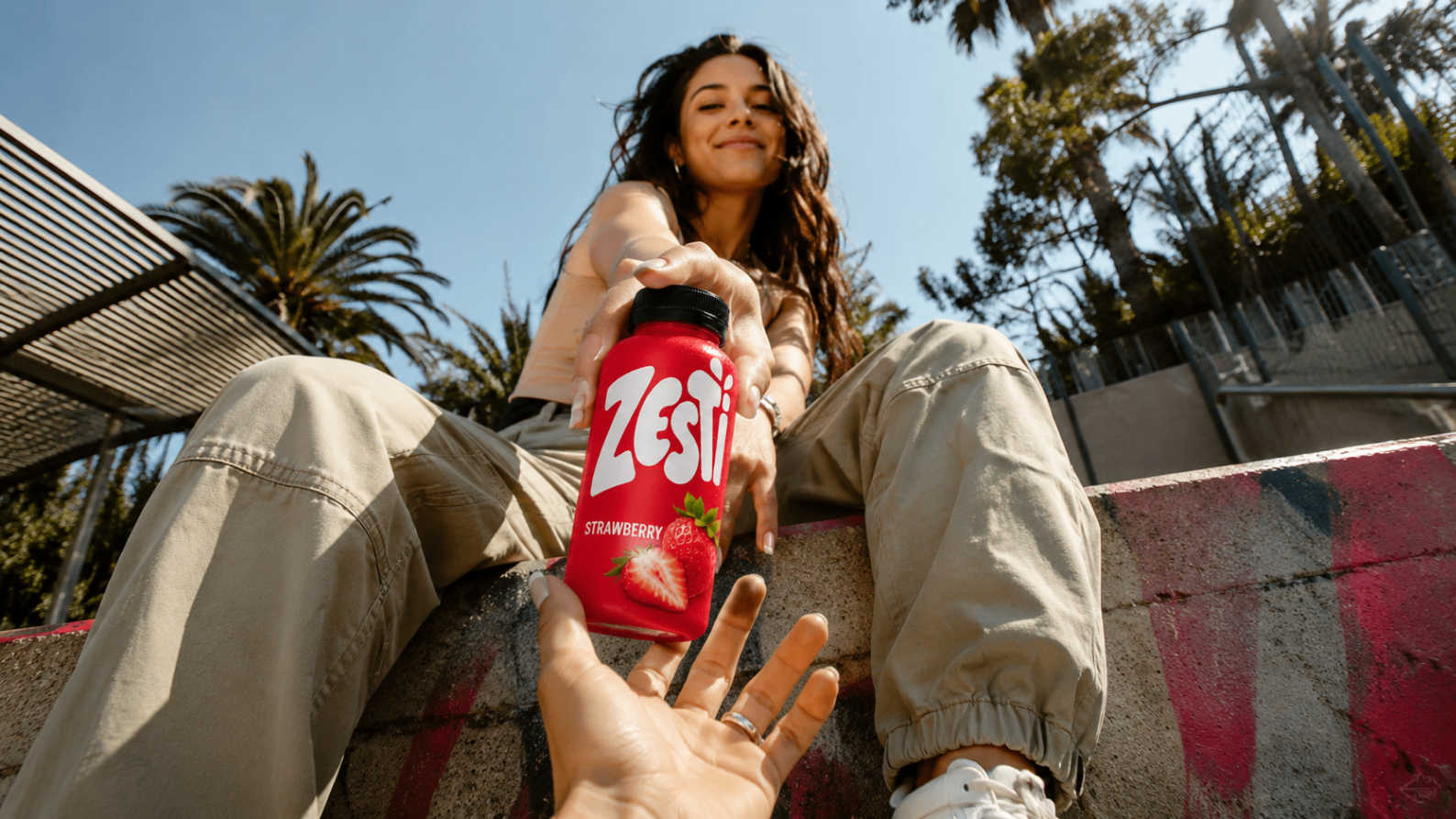 Low-angle Strawberry hero shot — direct handoff composition designed for launch posts and thumbnail moments.
